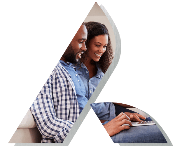 Couple reviewing financing on their laptop. Couple reviewing financing on their laptop.