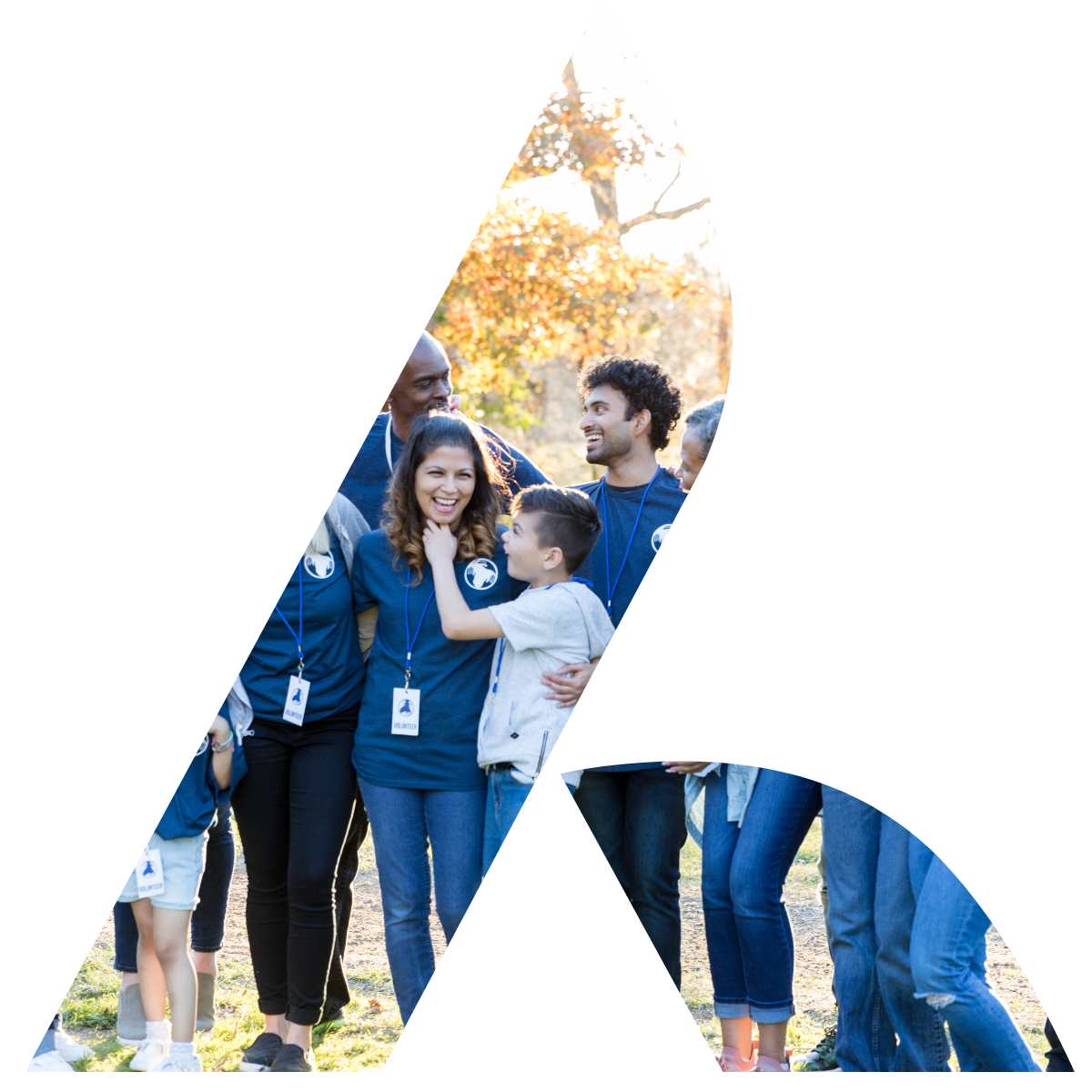 Group of volunteers in blue shirts helping a children's program.