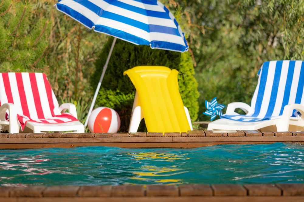 swimming-pool-in-summer-garden-2023-11-27-04-53-26-utc