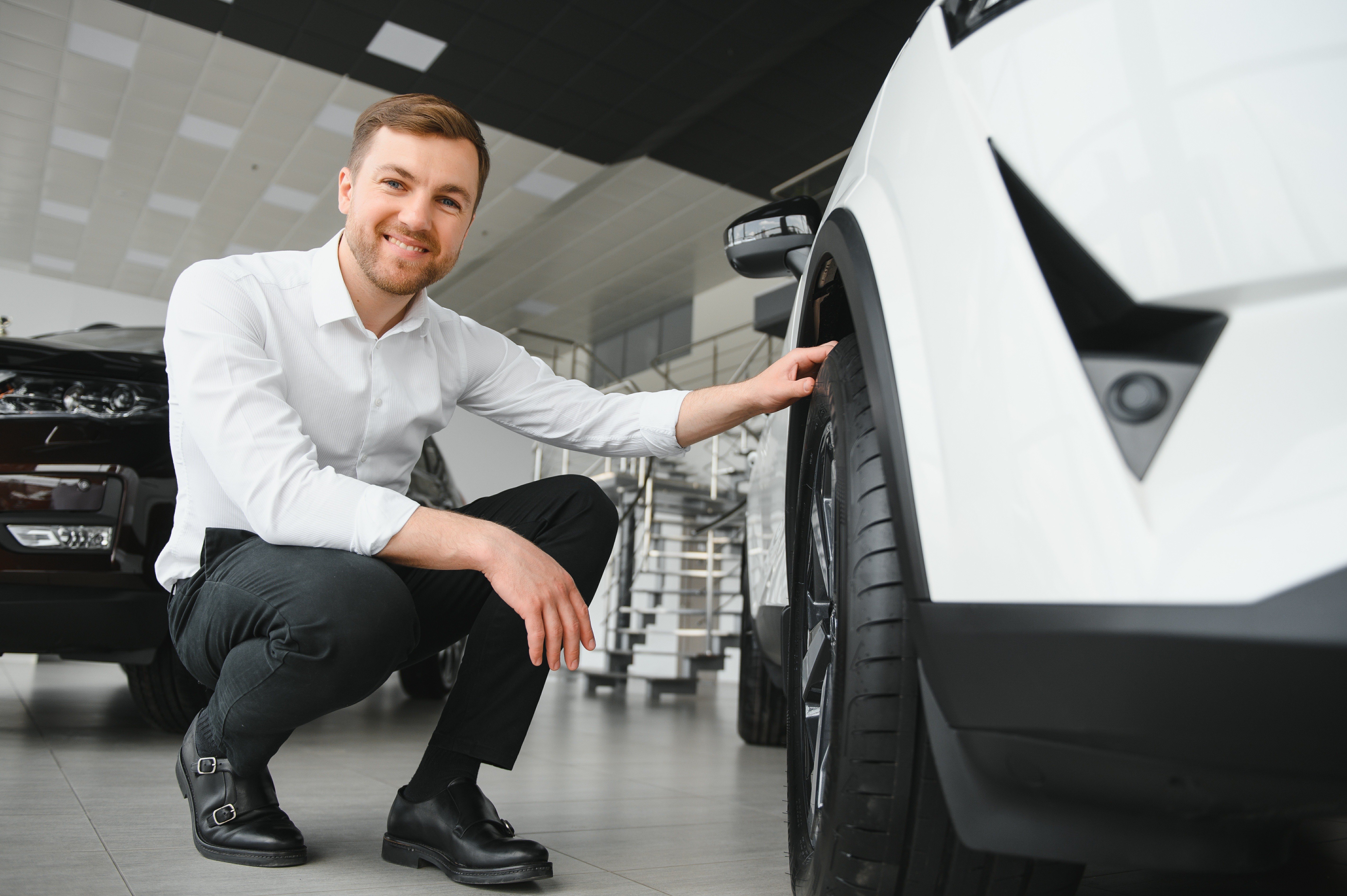 Man Standing Near Car